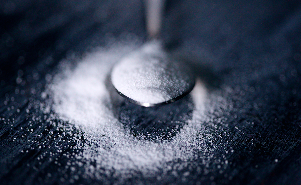 Pre-Diabetes and Insulin Resistance, image of a spoon with sugar on it.