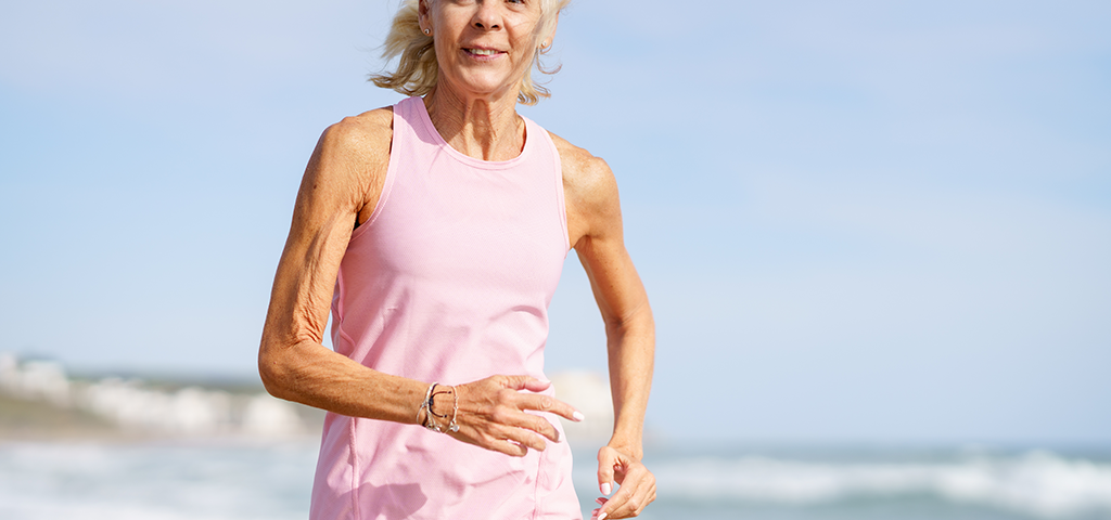 Is It Possible to Reverse Your Age?, image of an older woman running on the beach