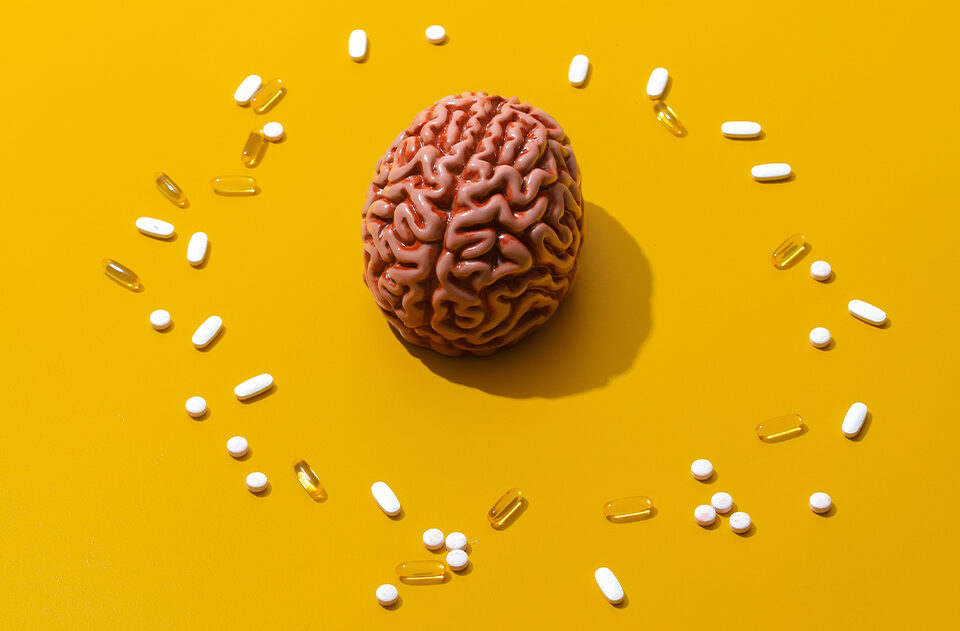 Brain Health Supplements: How Vitamin D3 and K2 Boost Focus, image of brain and vitamins.